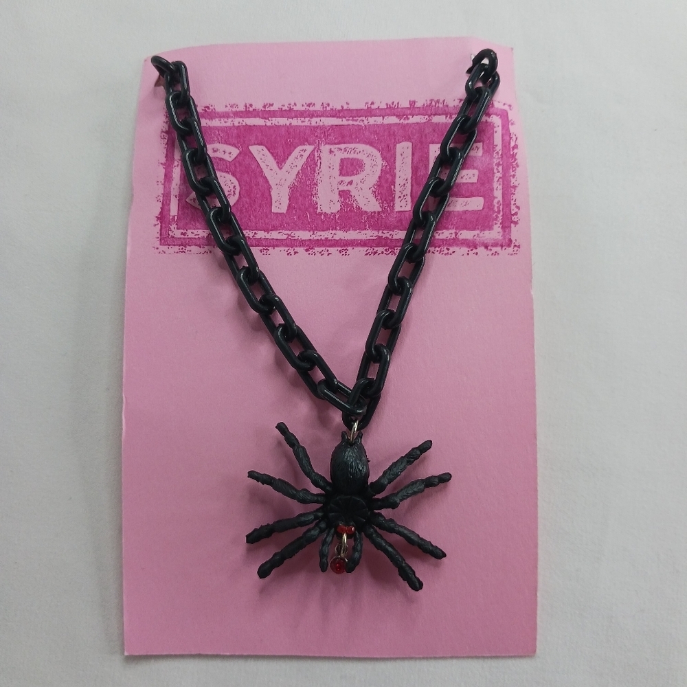 Black Plastic Link Necklace with Black Spider with Red Rhinestone.